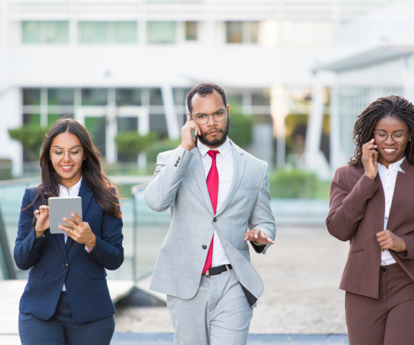 multiethnic-business-team-with-gadgets
